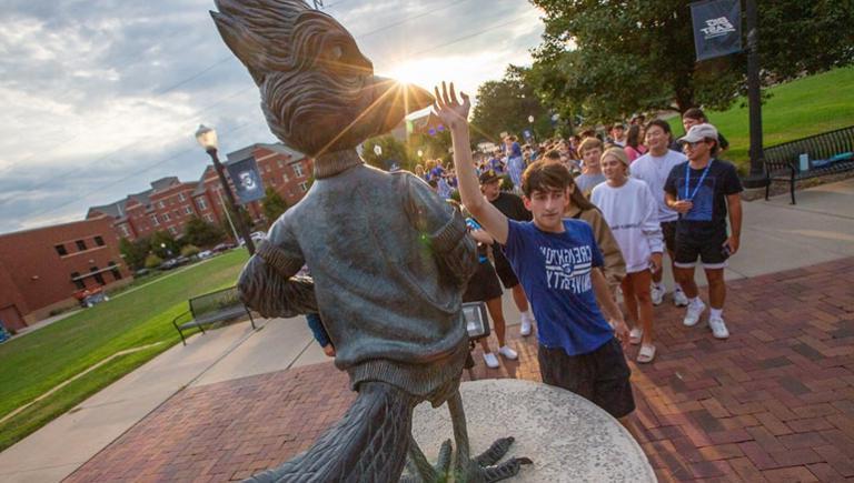 The tradition of students touching Billy Bluejay's beak