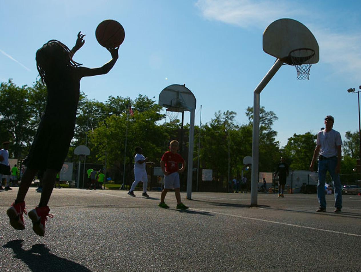 HS-MACA community outreach, playing basketball