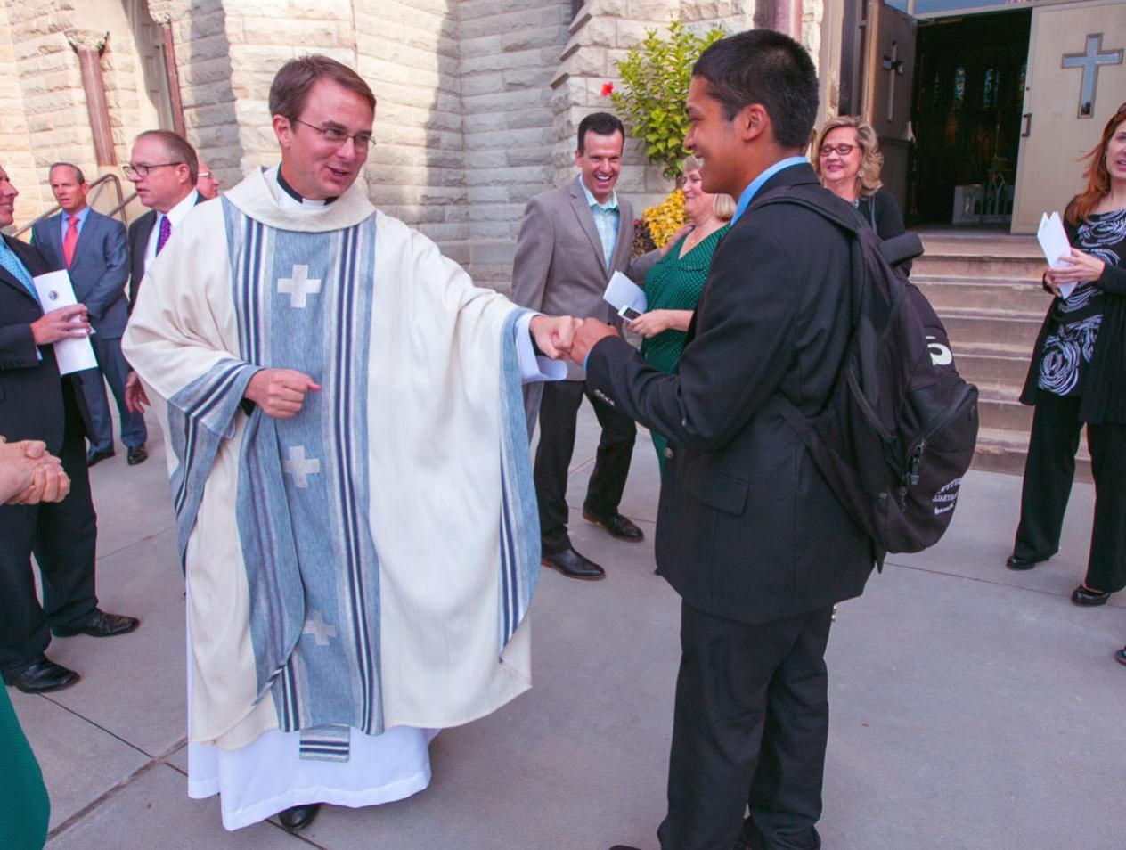 Father-Hendrickson-St-Johns-Church-Creighton-University