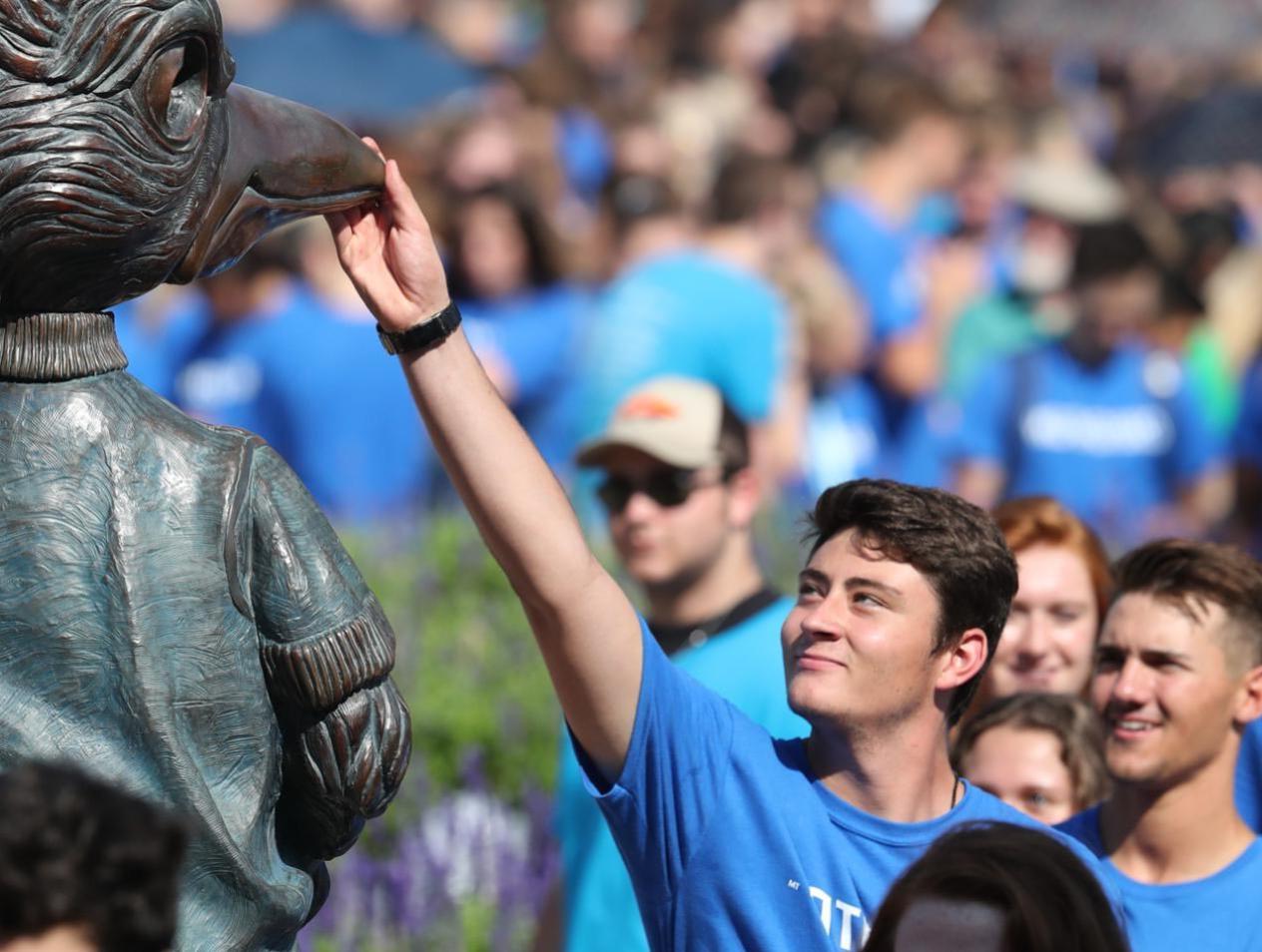 creighton-university-student-touching-billy-bluejay