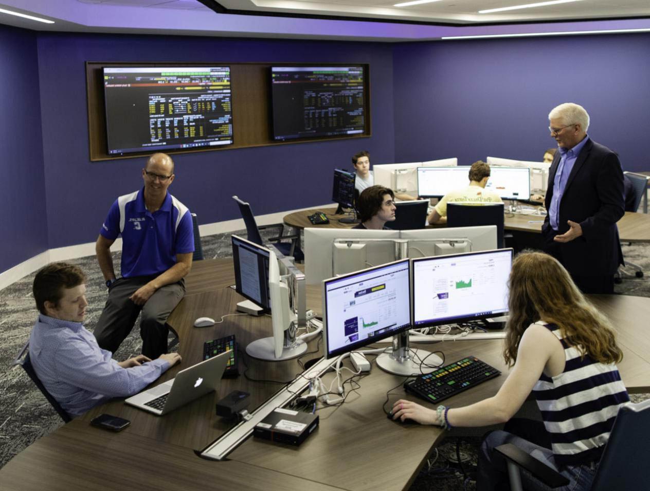 students and professors in heider college of business