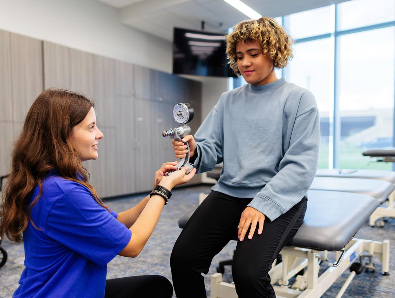 OT student testing patient